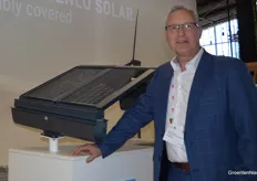 Leo van der Ven next to the Solar Carport System of Flexibell Energy Systems.